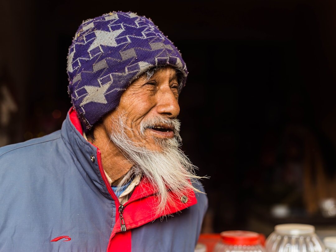 Portrait of a friendly elderly Swiss man smiling warmly