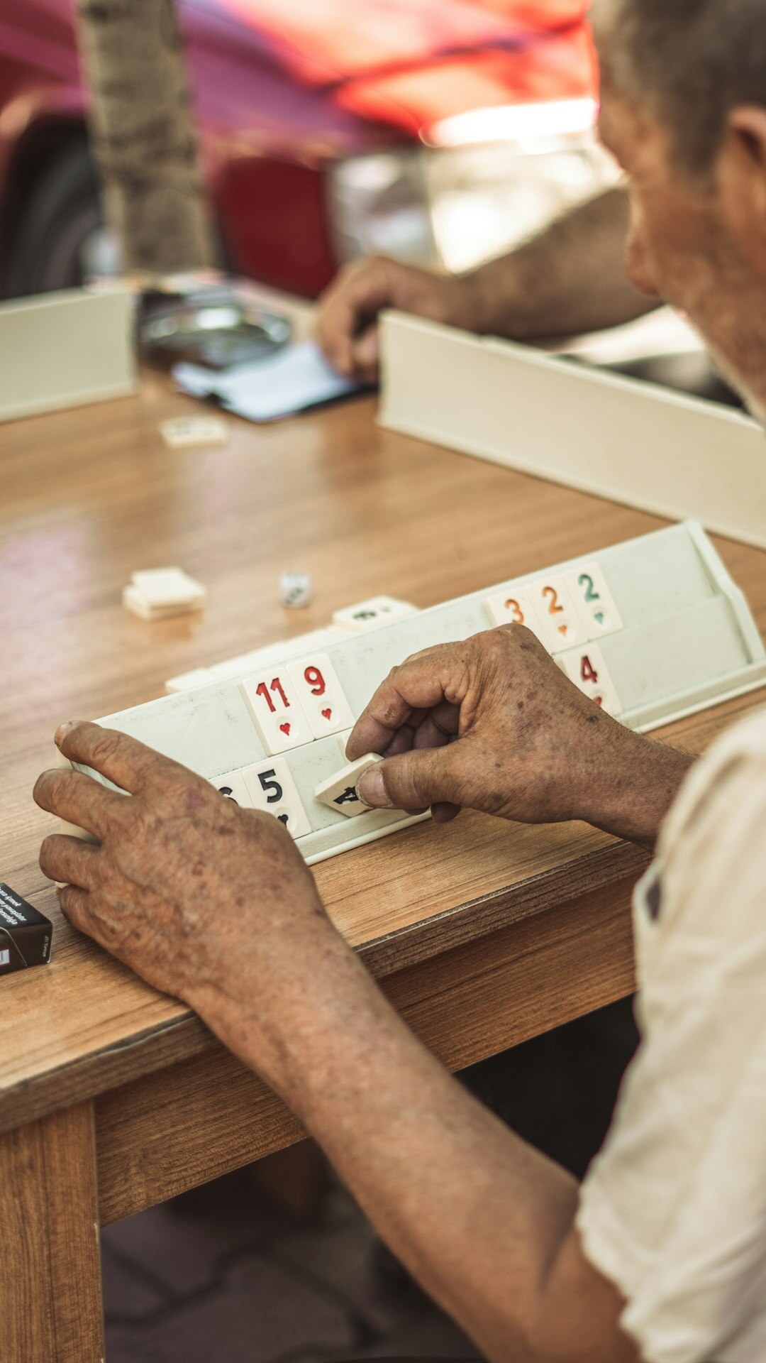 group of seniors playing cards