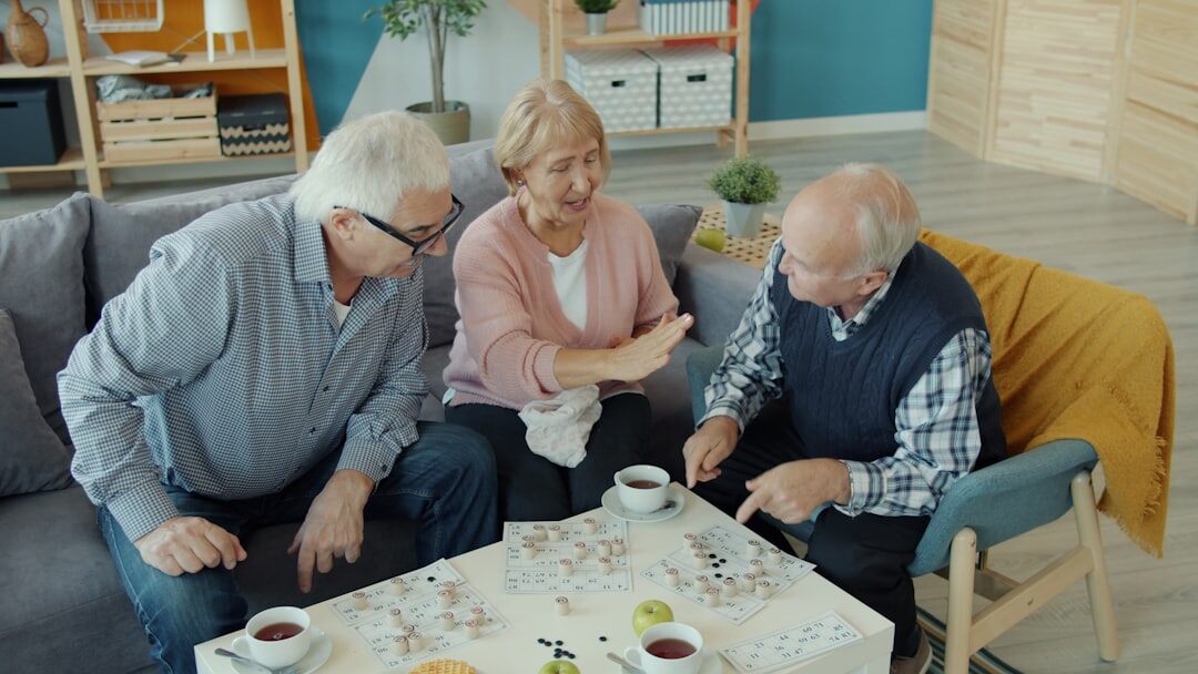 seniors enjoying meal together