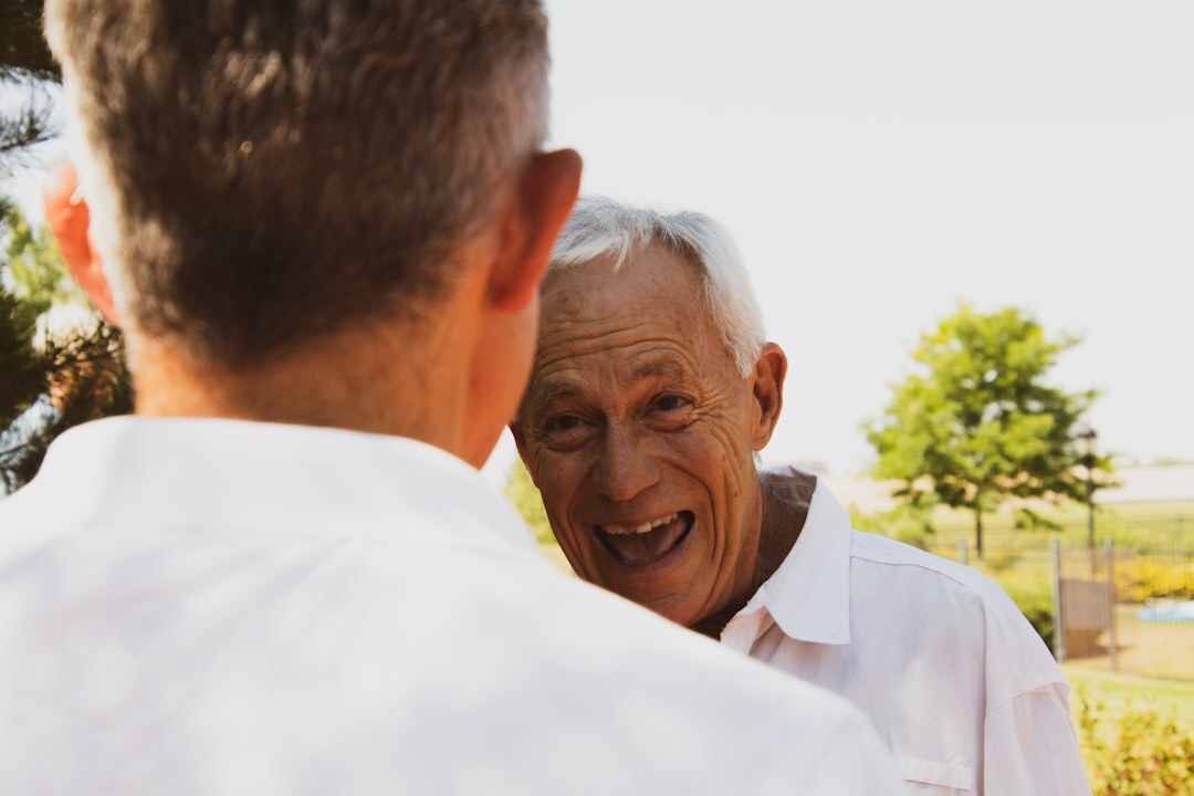 elderly neighbors chatting outside